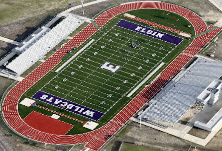 Overhead perspective of a football field and stadium