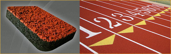 A track and field area featuring a rubber mat surrounded by a running track